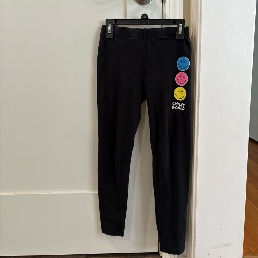 Smiley world leggings, size 7/8